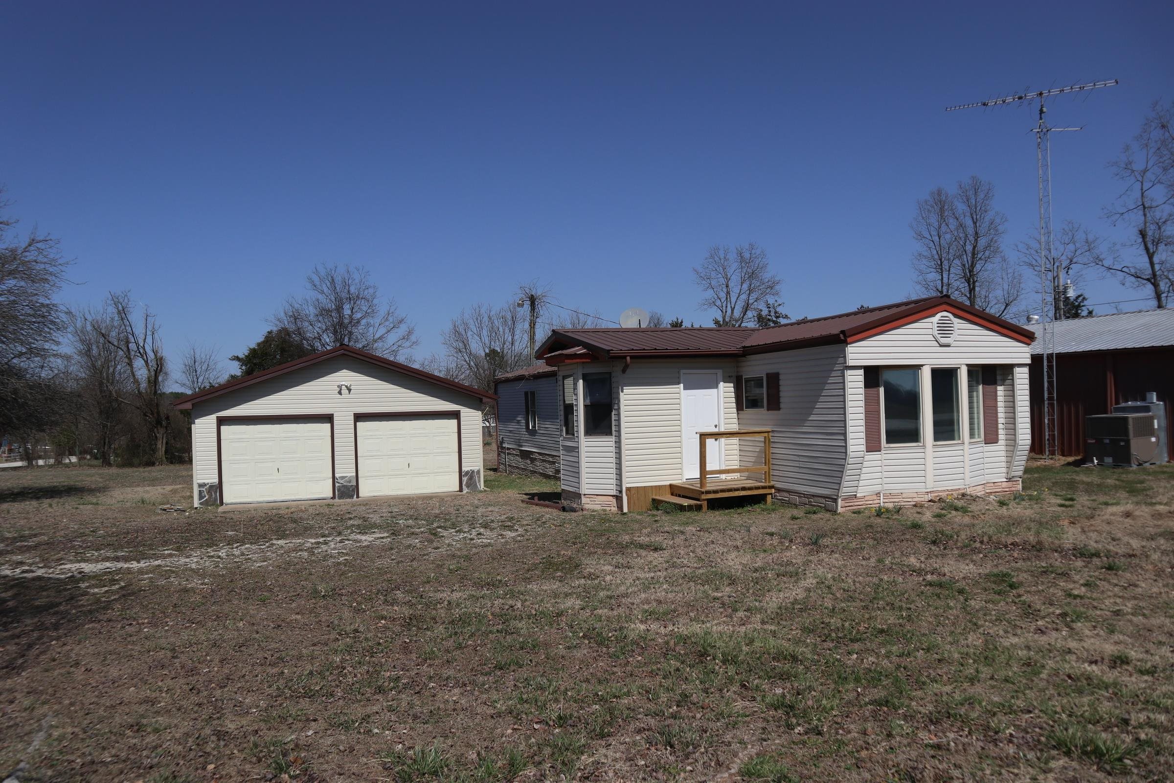 address: 12942  Hwy 62/412 E  