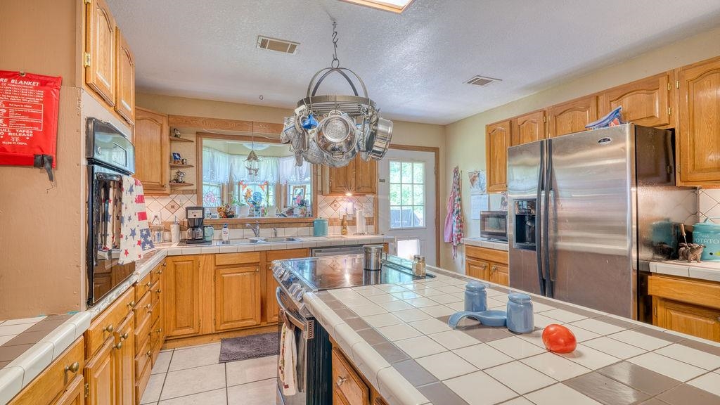 Photo 18 - Residential for sale – 1700  Sanders   Charlotte, AR