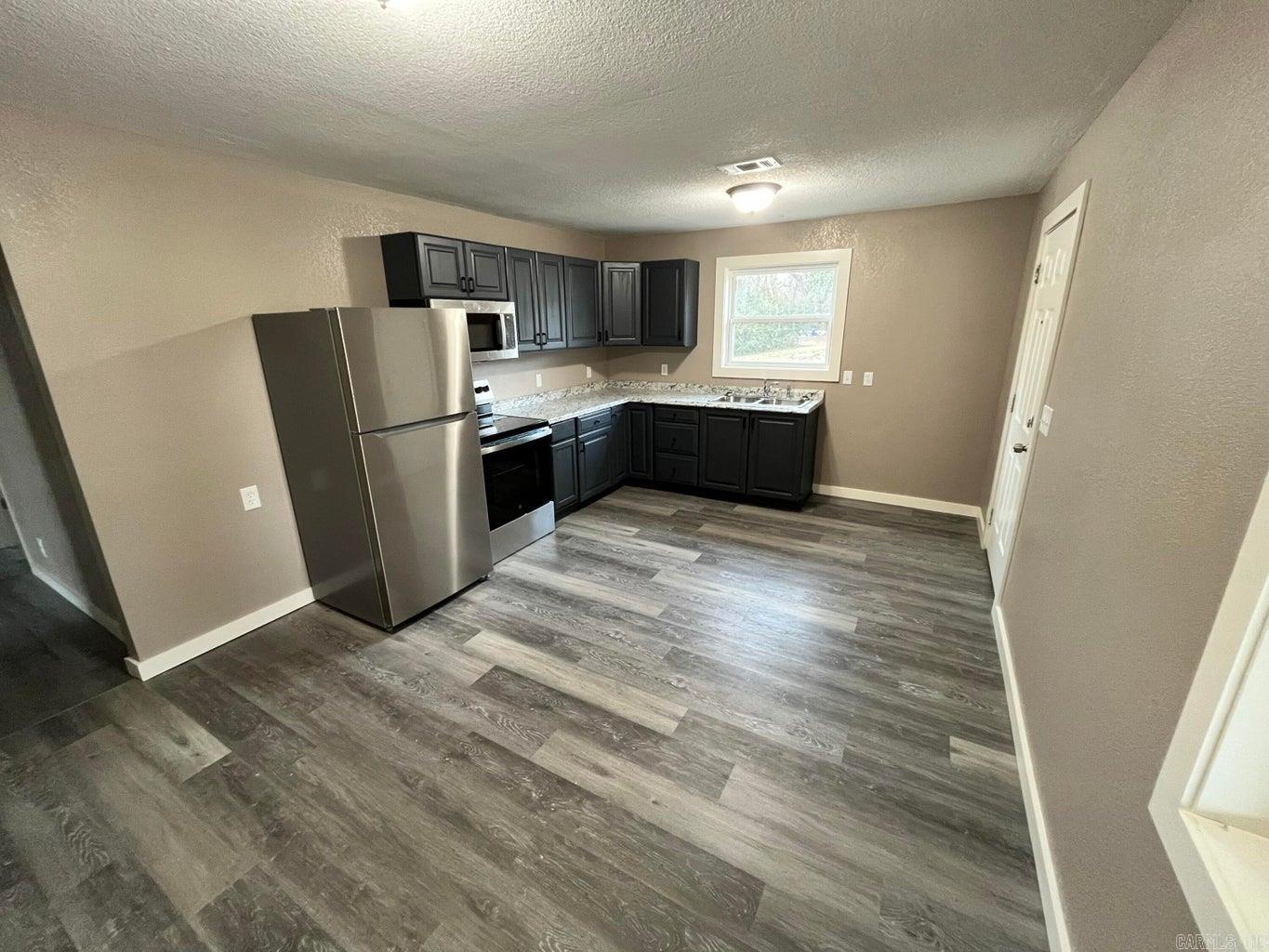 Photo 10 - Residential for sale – 110 W 7th   Newark, AR